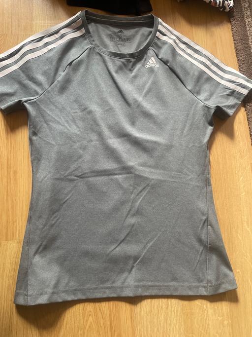  — Adidas size 8-10 top