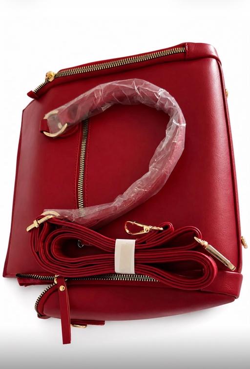  — Women’s red faux leather hand bag satchel