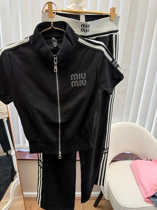  — Tracksuit size -10/12