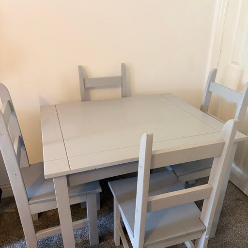  — Table and chairs