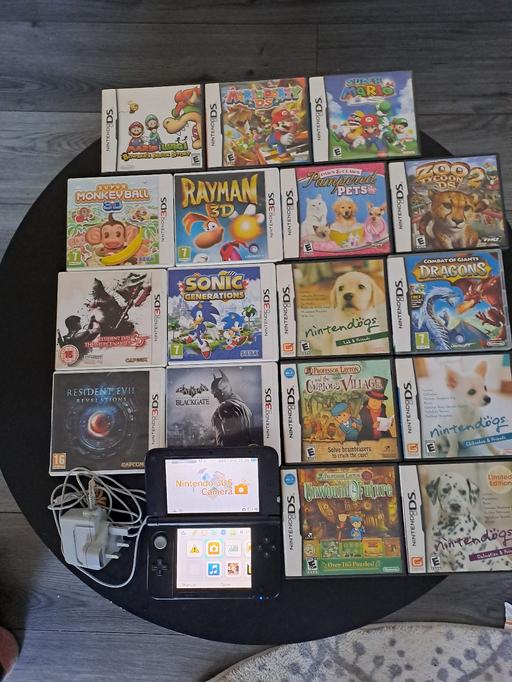  — Nintendo 3ds XL,charger and 17 games