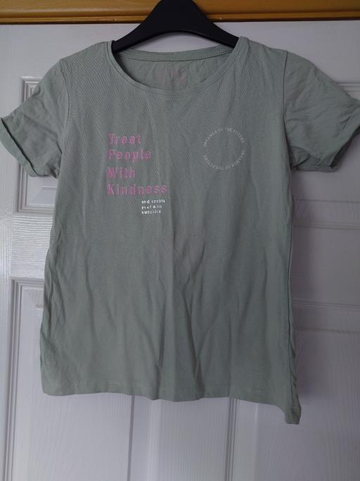  — Girls green top size 11-12 years