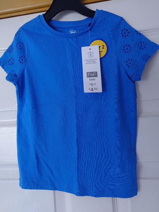  — Girls blue top size 4-5 years