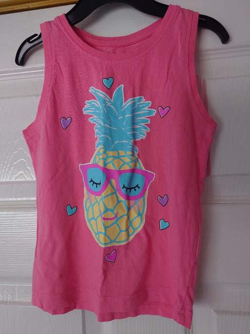  — Girls pink vest top size 4-5 years