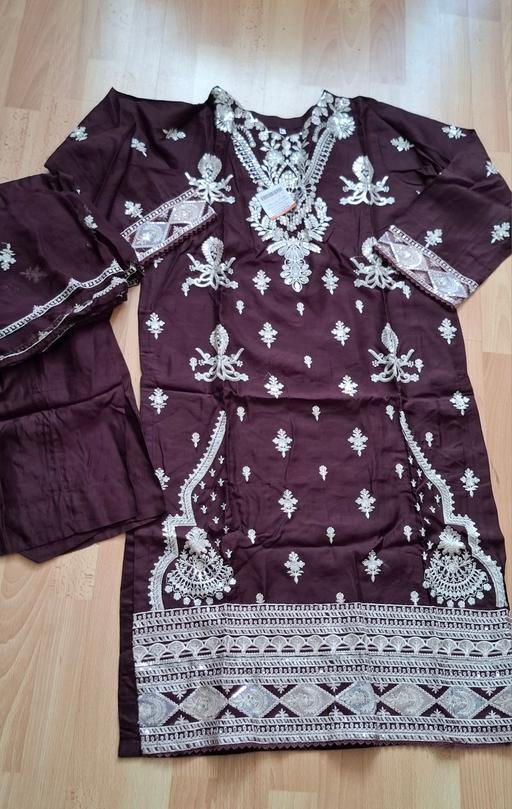  — Embroidered asian suit