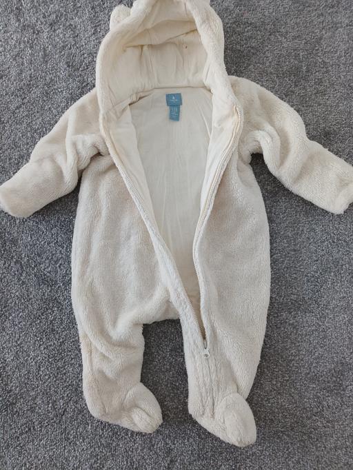  — CREAM  SNOWSUIT.