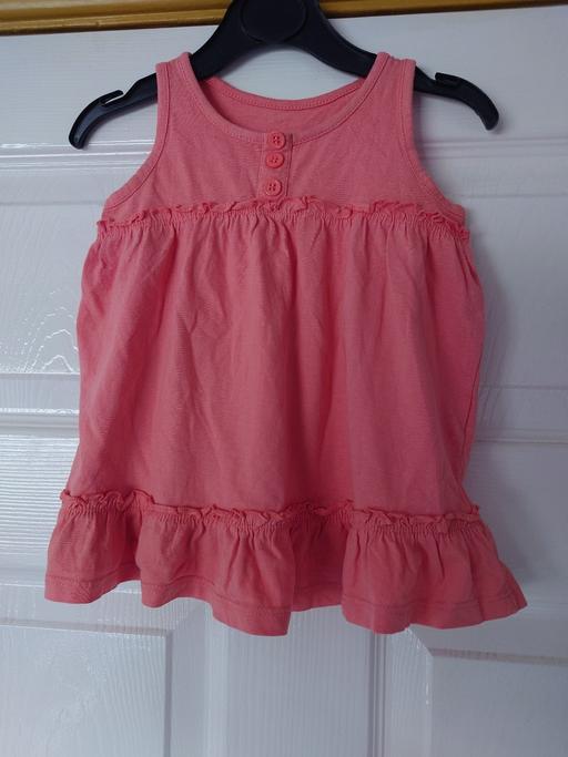  — Baby girls orange dress size 6-9 months