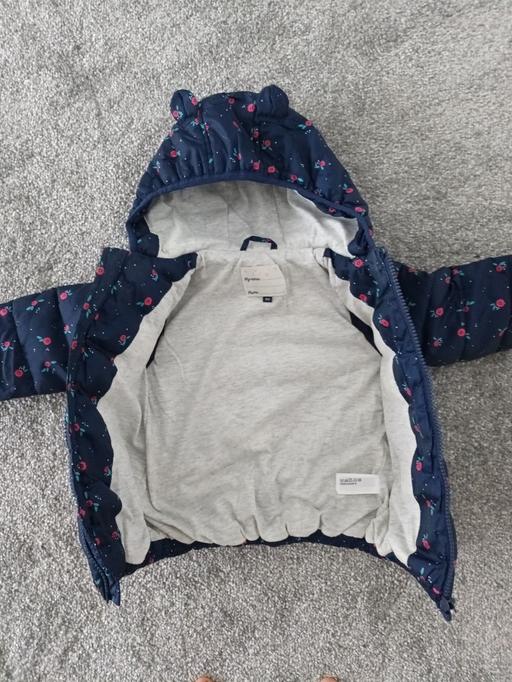  — BABY COAT