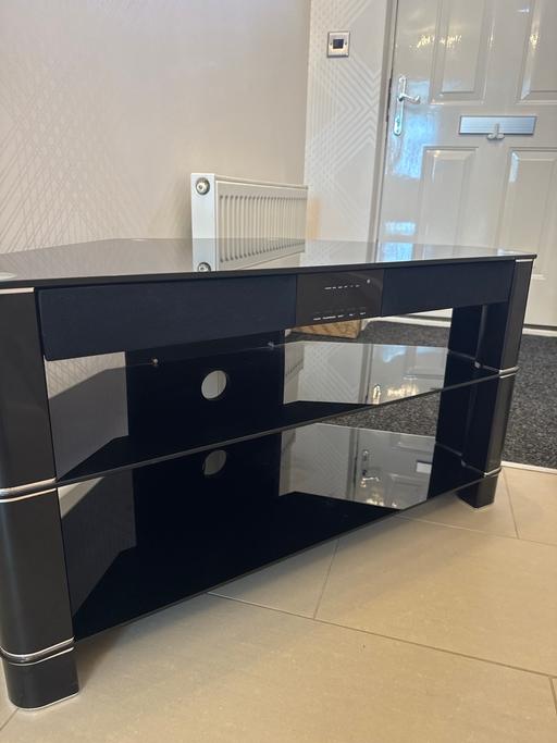  — Glass tv stand with inbuilt surround sound