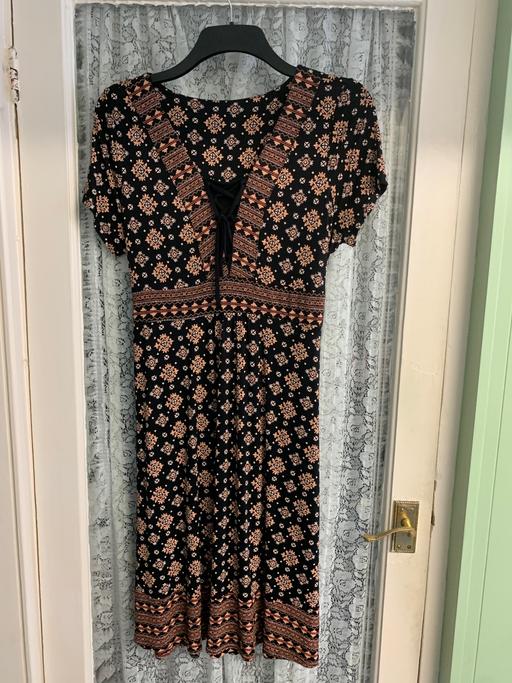  — Dress