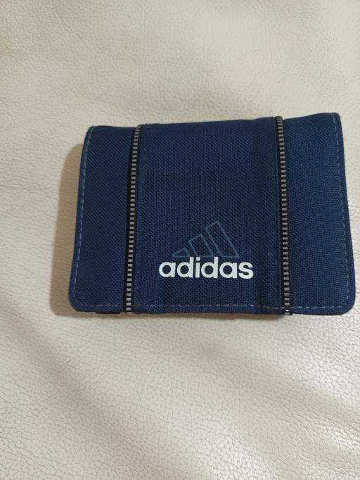  — ADIDAS WALLET