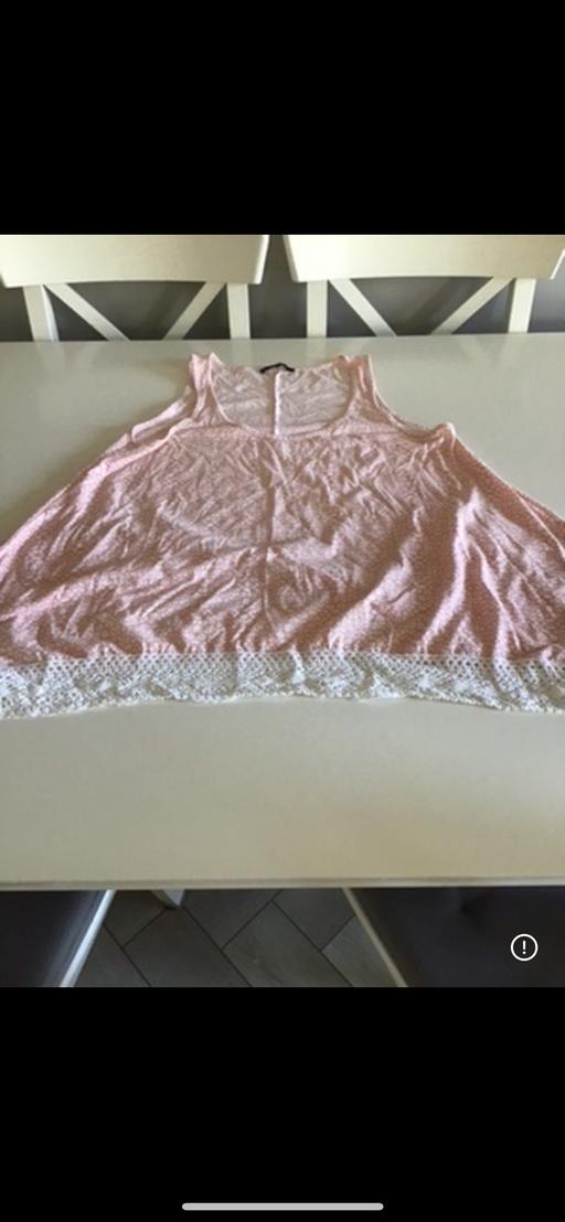  — Ladies pink frill top Size 16