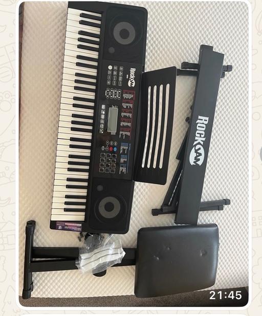  — Electric Keyboard and stool