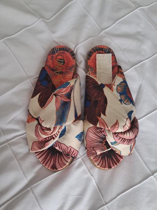  — BRAND NEW SLIPPERS