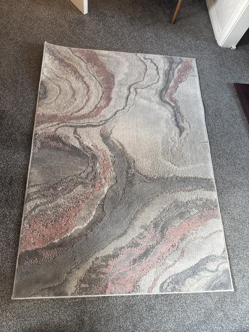 — Rug
