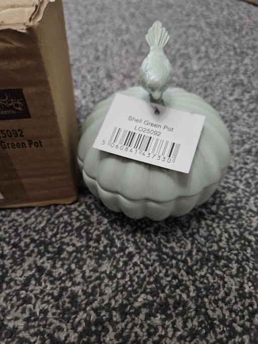  — brand new bird trinket