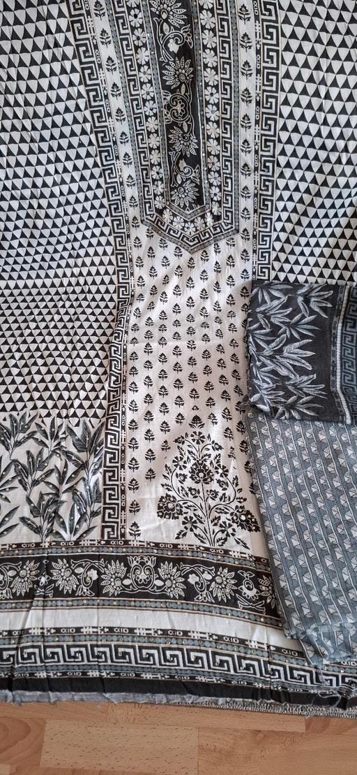  — Mirrored unstitched cotton suit