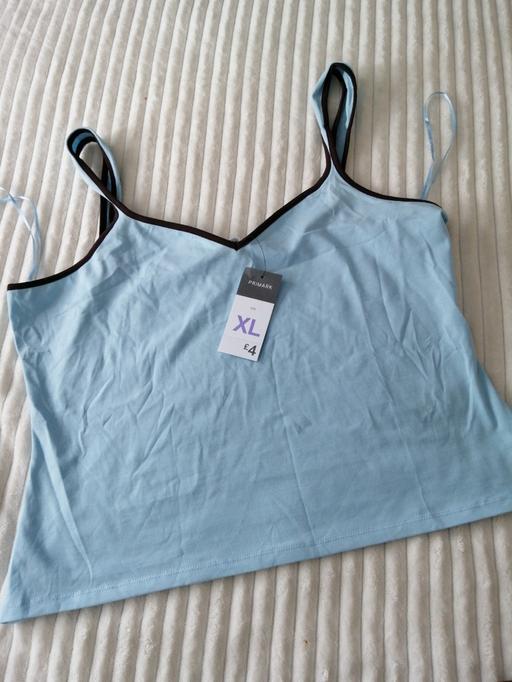  — ladies size *XL*