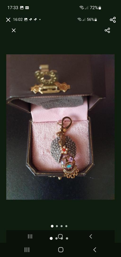  — juicy couture genie charm