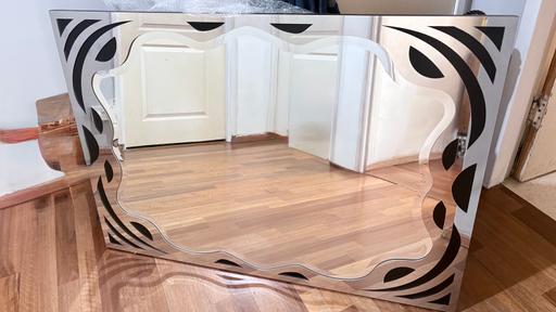  — Mirror with silver and black bezel detail