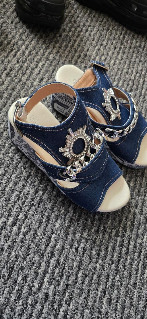  — sandals