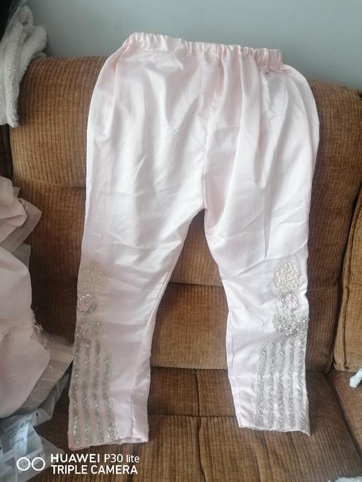  — ladies Asian suit
