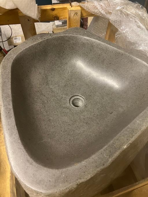  — Natural river stone bespoke pedestal basin.