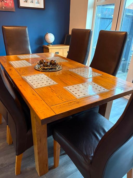  — Dining room table and corner cabinet