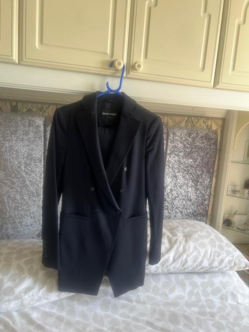  — Emotion Armani suit