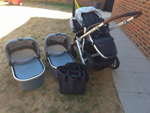  — Twin Buggy with Carry Cots and car seat adapt