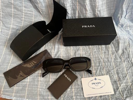  — Prada Sunglasses