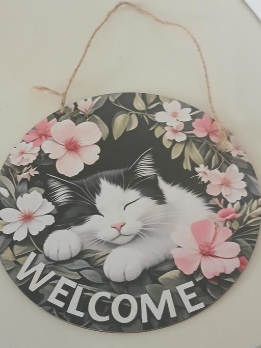  — Plaque)
