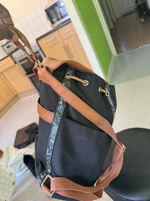  — Backbag