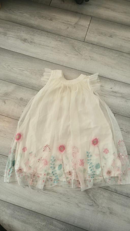  — Dress