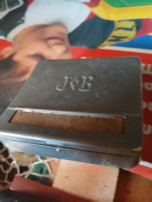  — old tobacco box and roller