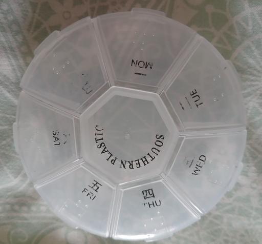  — Tablet container)