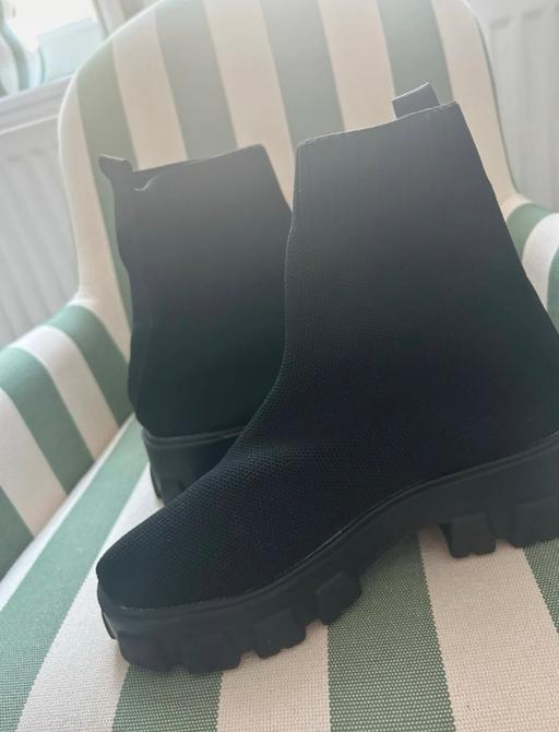 — Black sock boot