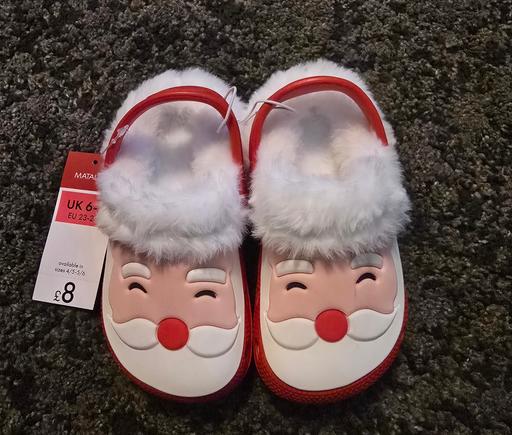  — NEW size 6-7 childs xmas santa clogs
