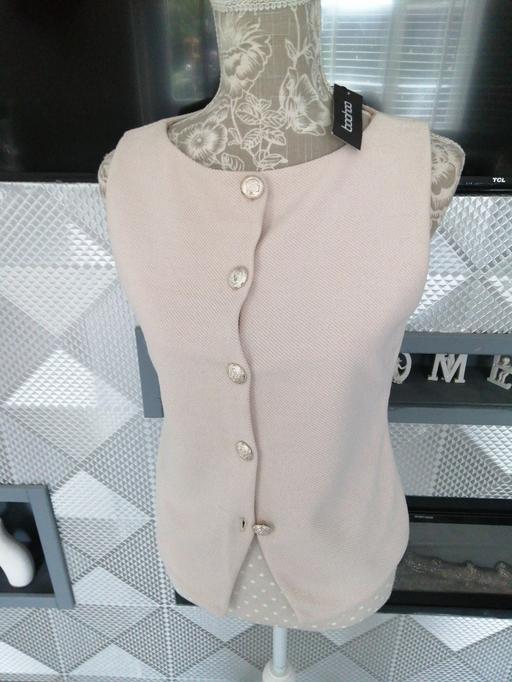  — ladies size *14*
