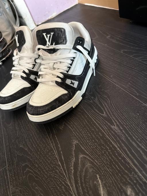  — Pre owned LV low top sneakers
