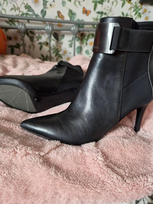  — Calvin Klein ankle boots