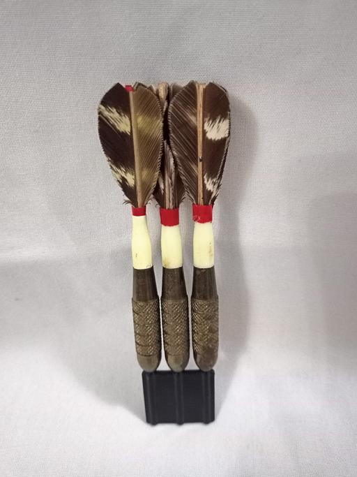  — VINTAGE MILBRO BRASS DARTS/FEATHER FLIGHTS.