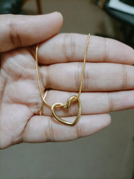  — gold tone heart necklace