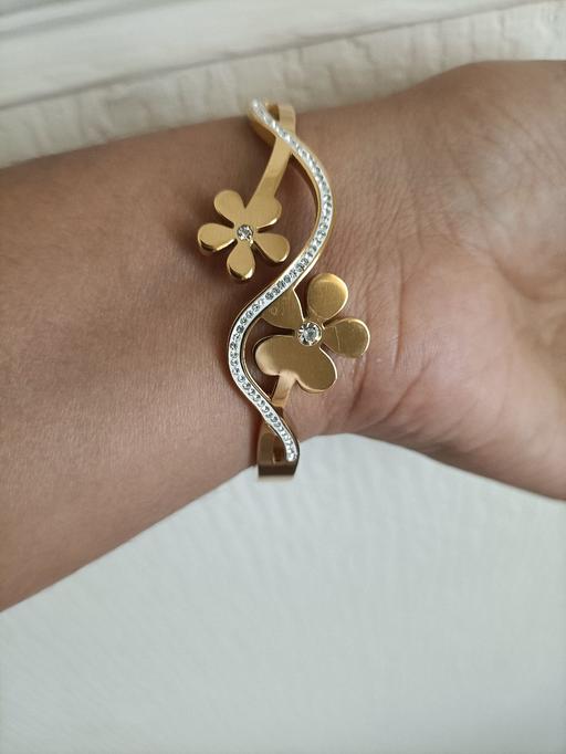  — gold-tone open cuff bangle