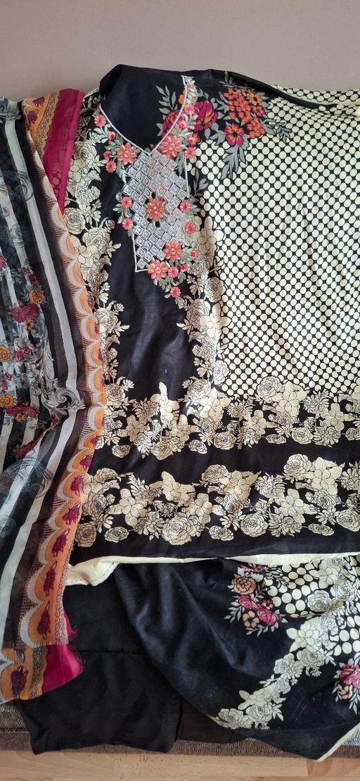  — Embroidered polka dot suit