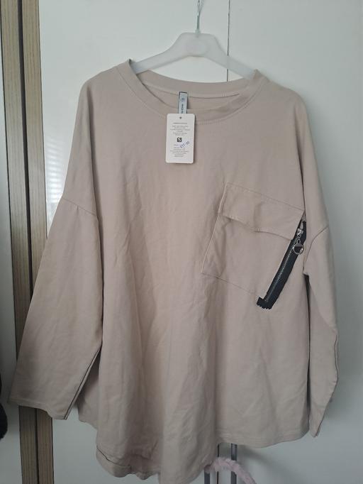  — large top
