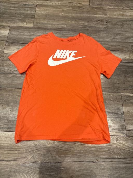  — Peach Nike top