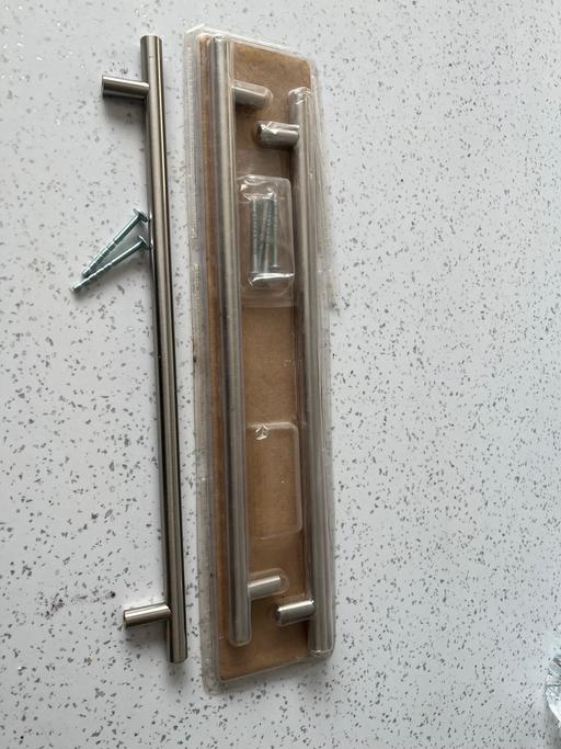  — Long rod handles