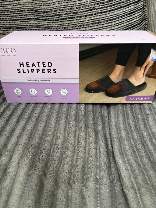  — Brand new heated slippers