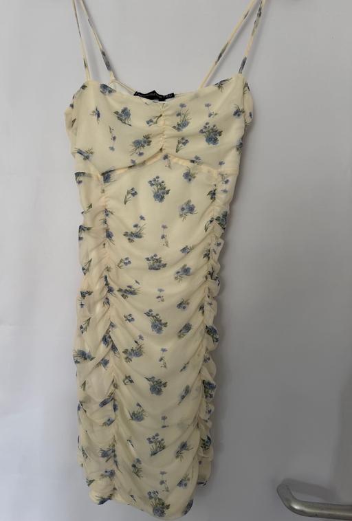  — Dress
